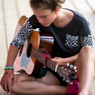 Girl playing guitar